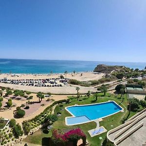 Top-Floor Beachfront Apartment With Parking, Pool, & Spacious Sea-View Balcony